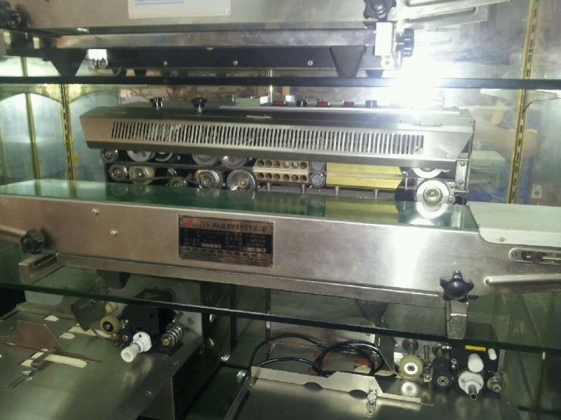 1000型卧式墨轮印字封口机