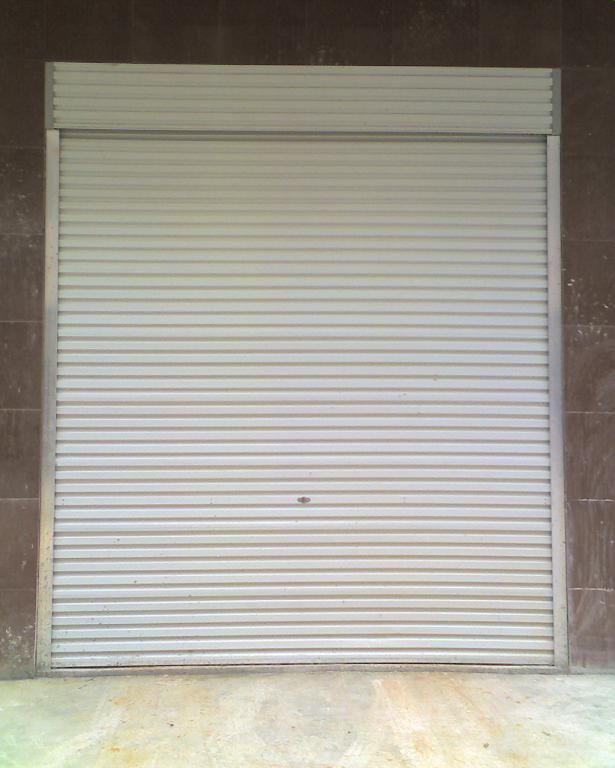 观澜彩钢板无声门 新安大浪网闸门 镀锌卷闸门兴发厂家维修